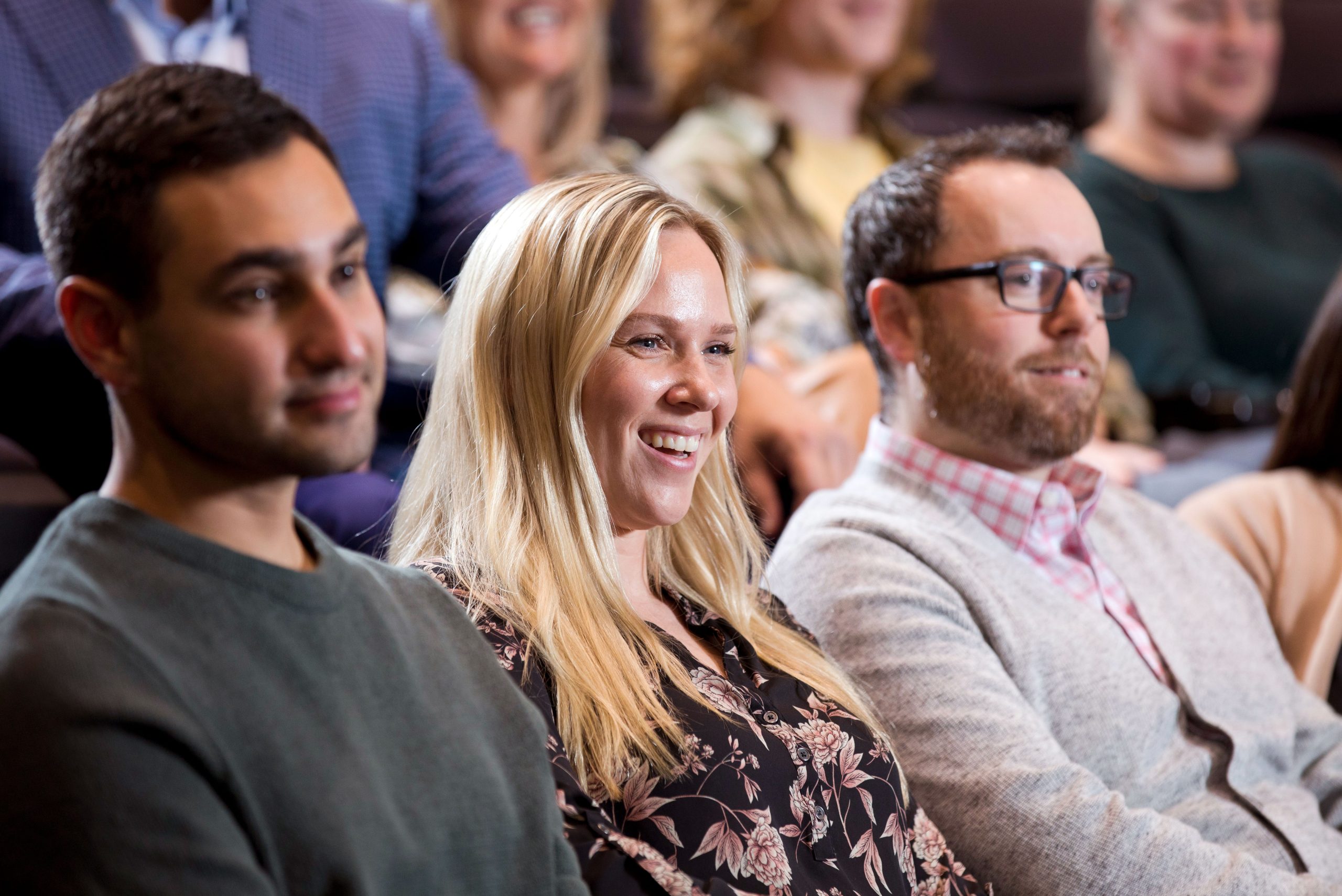 Smiling members of audience